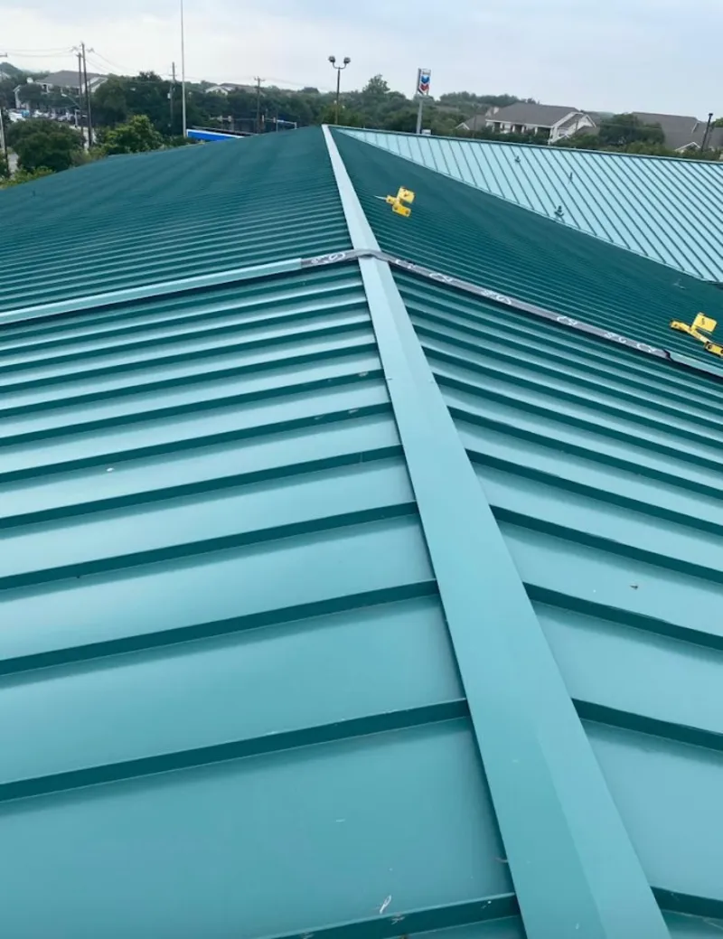 Green commercial metal roof ridge and valley for Metal Roof Repair in Edwards
